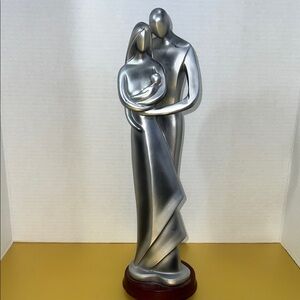 Elegant Silver Family Sculpture